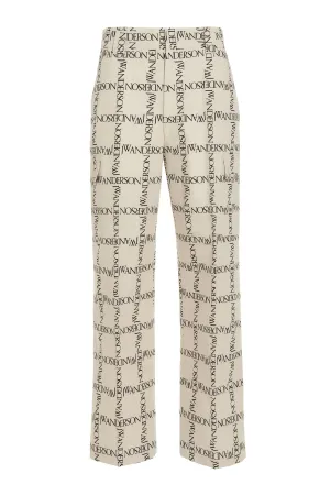 JW Anderson Allover Logo Printed Trousers
