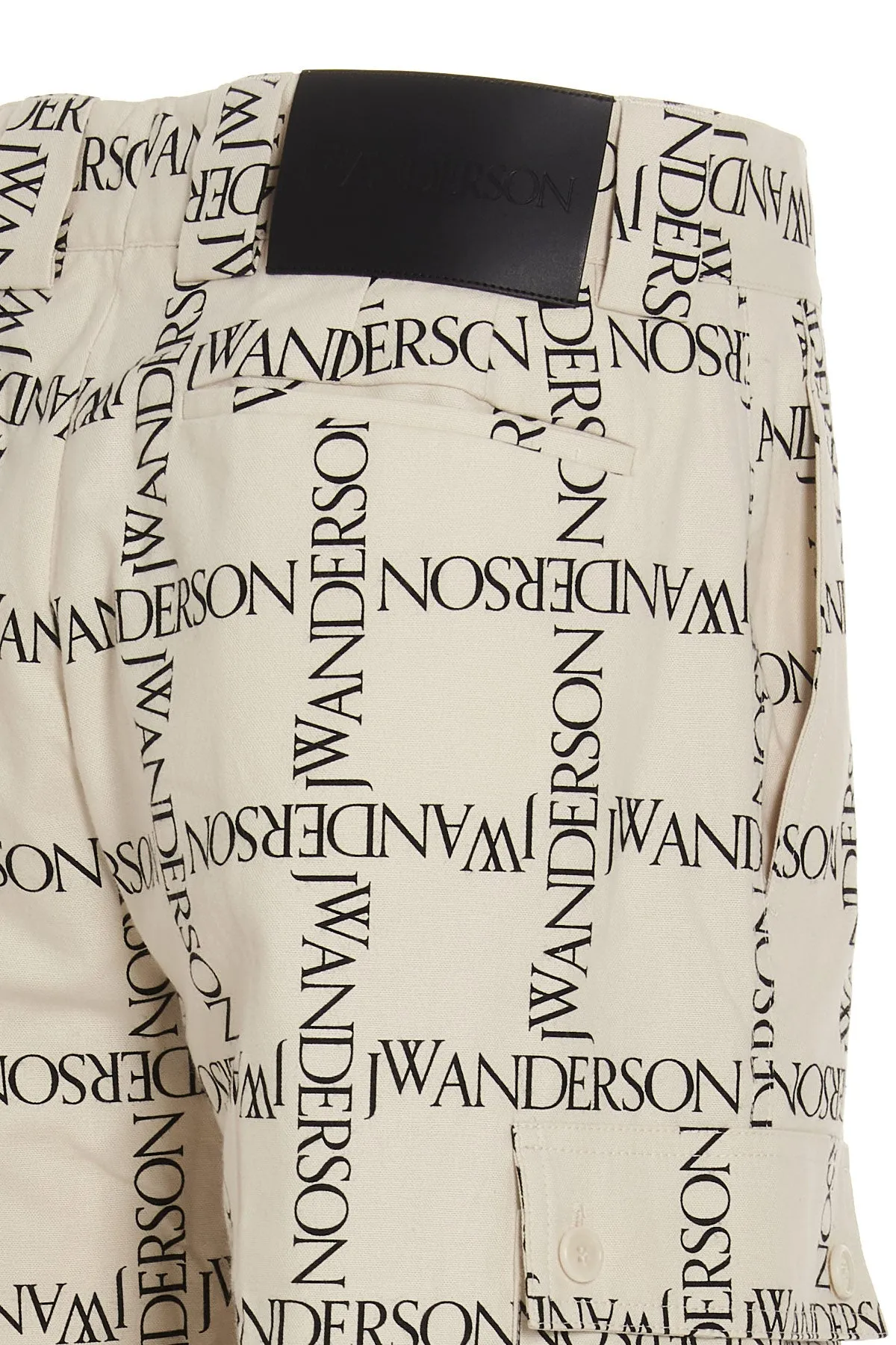 JW Anderson Allover Logo Printed Trousers